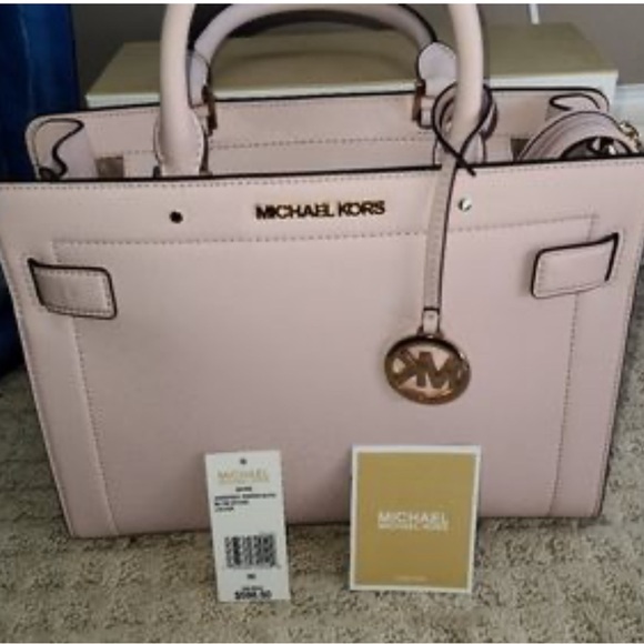 Michael Kors Handbags - NWT Michael Kors Rayne satchel Elegant blush Pink Handbag w feet. New never used